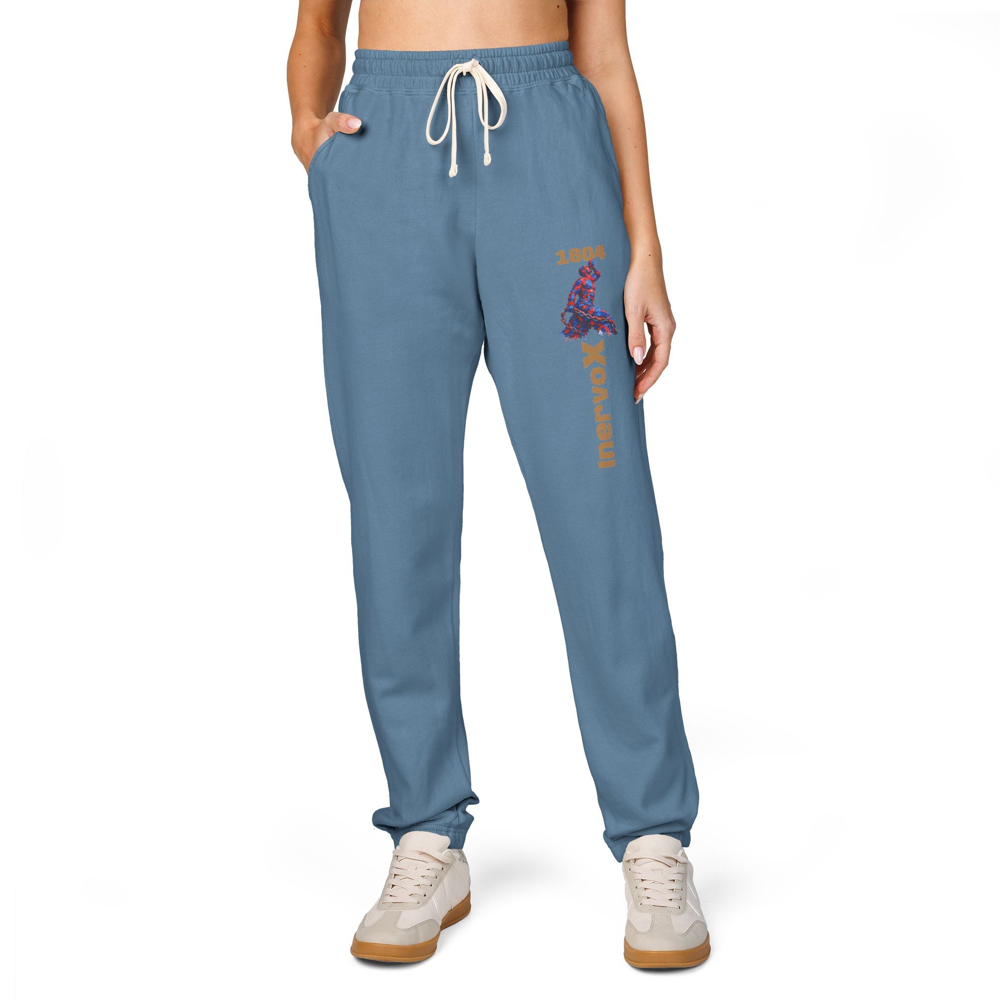 Blue sweatpants with a patch on a white background