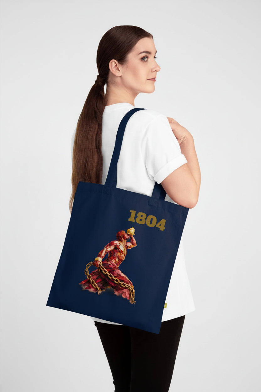 Woman holding a navy tote bag with a design and '1804' text on a white background