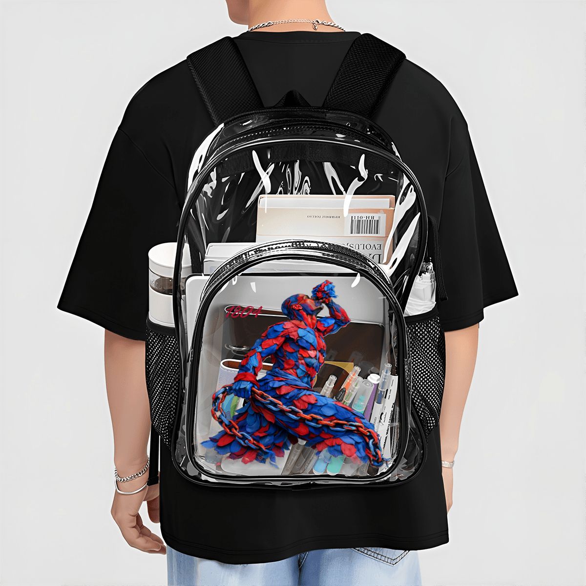 Person wearing a transparent backpack with a red and blue dog toy inside, on a plain background