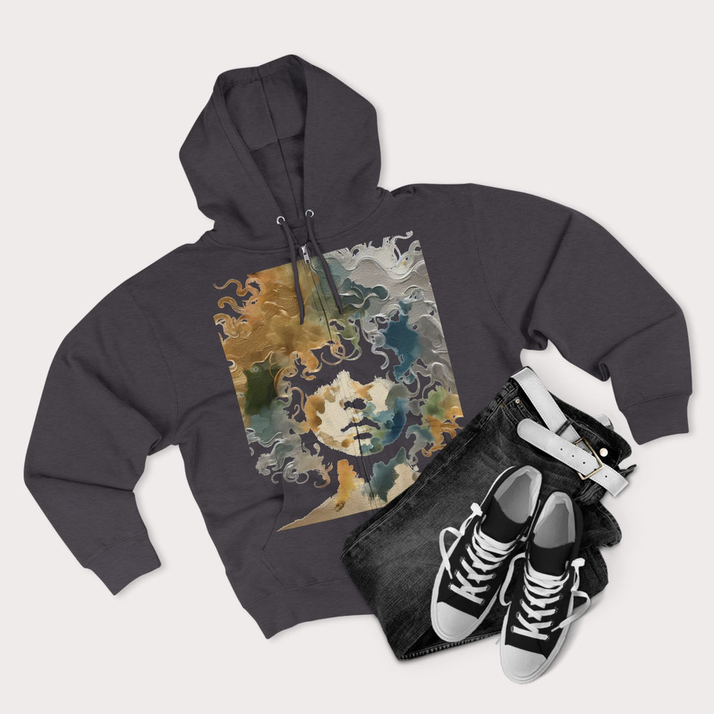 Dark gray hoodie with a colorful graphic design, black leather jacket, and black sneakers on a light gray background