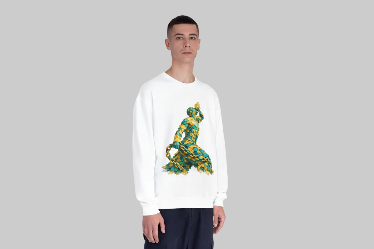 Person wearing a white sweatshirt with a colorful graphic design on a plain background
